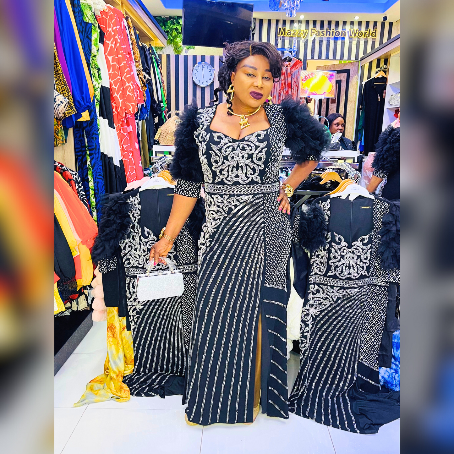 Elegant black and gold Starry Night gown with intricate patterns and a stylish slit