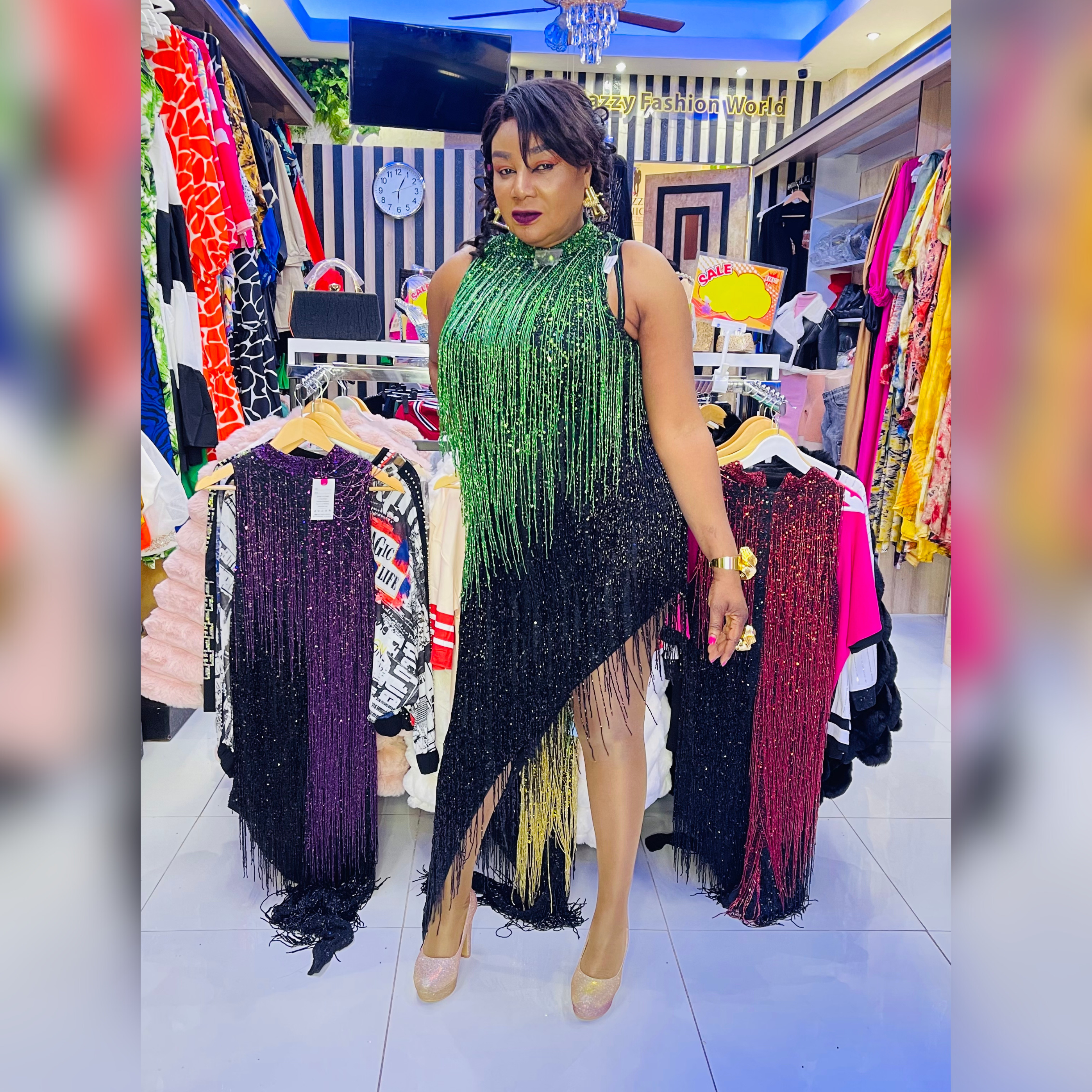 Dusk Till Dawn fringe dress in green and black, perfect for glamorous evening events and parties